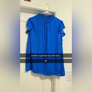 Royal blue top, size L, worn a couple times but in good condition.